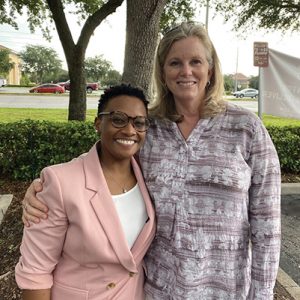 Whitney Hanley standing with UCF exceptional education professor Rebecca HInes